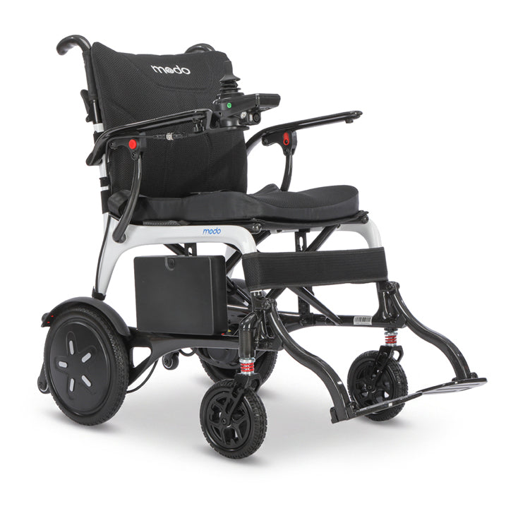 Modo Breeze Ultralightweight Folding Electric Wheelchair with a black padded seat and backrest, a white frame, black wheels, and a side storage battery, shown on a white background.