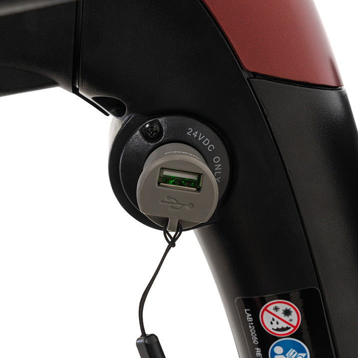Close-up of a vehicle's USB charging port with a white background