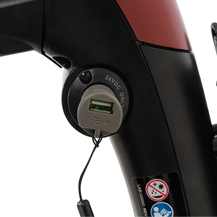 Close-up of a electronic component with USB port and power indicator on a white background