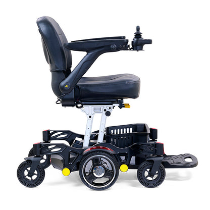 Black electric wheelchair with armrests and foot pedals on a white background