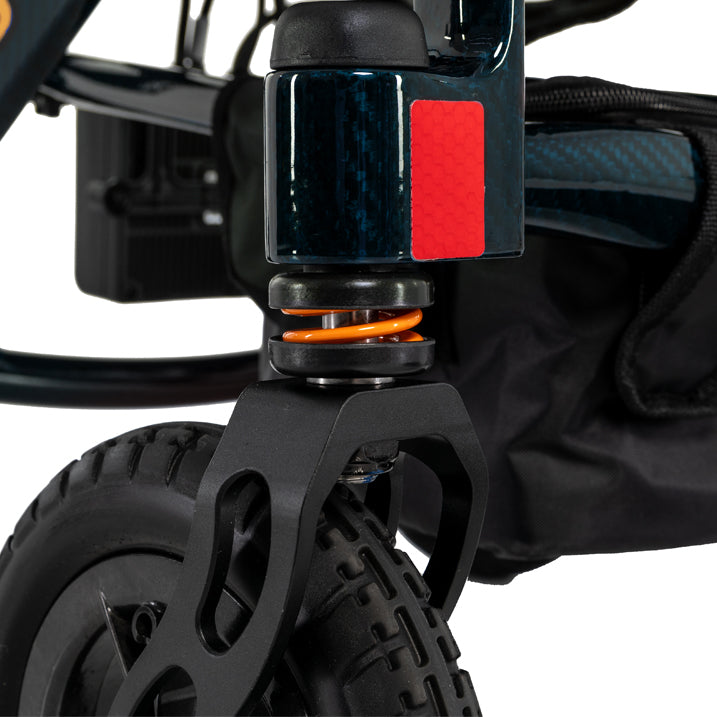 Close-up of a black scooter with a red and blue component on a white background