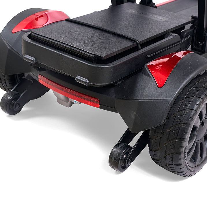 Close-up of a black and red scooter with a white background