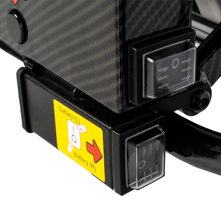 Close-up of a carbon fiber component with electrical connectors on a white background