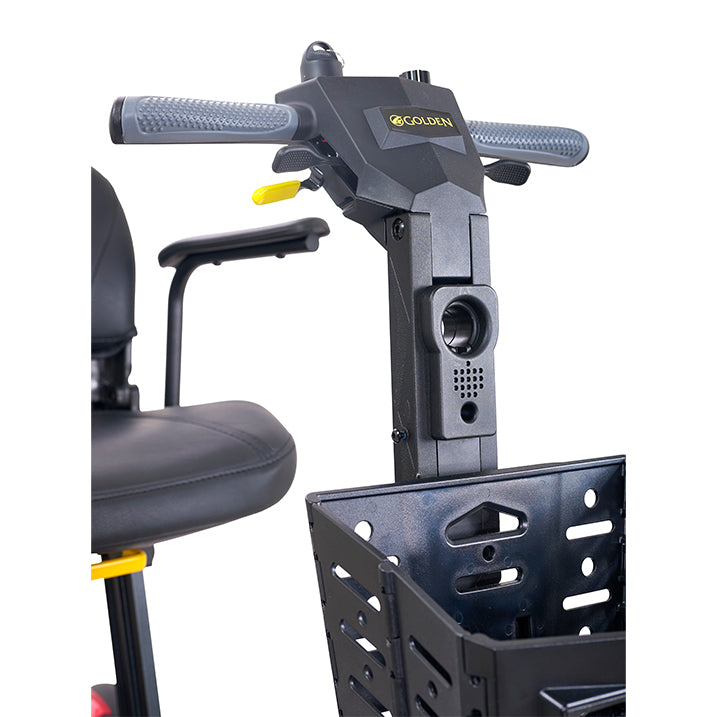 Close-up of a scooter with handlebar and basket on a white background