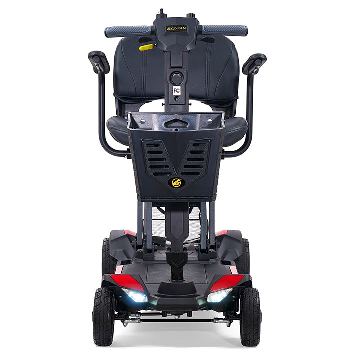 Black mobility scooter with red lights on a white background