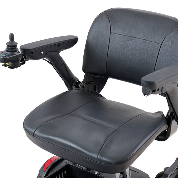Close-up of a black scooter seat and handlebar on a white background