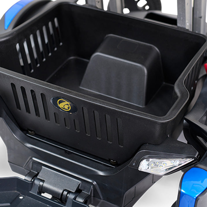 Close-up of a black storage compartment on a vehicle with a visible brand logo.