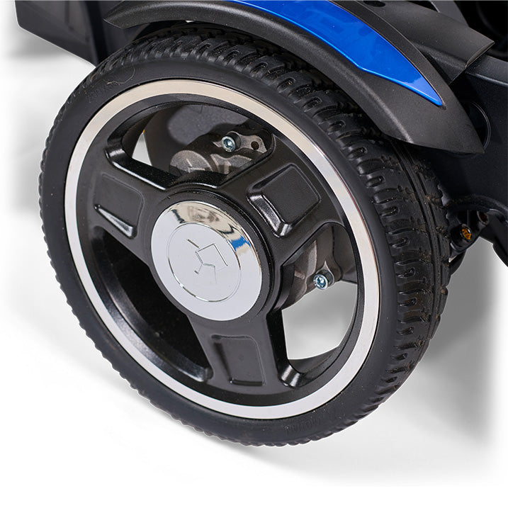 Close-up of a wheel with a visible brand logo on a white background