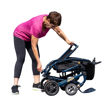 Woman adjusting a blue and black Pride jazzy carbon 27 night sky on a white background